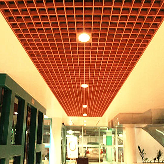 Orange open-cell grid in a commercial interior