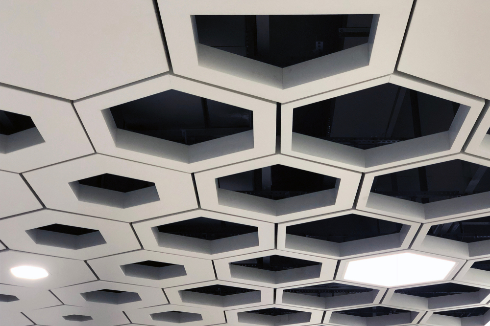 Honeycomb Plate Ceiling — open-centre geometric plate design