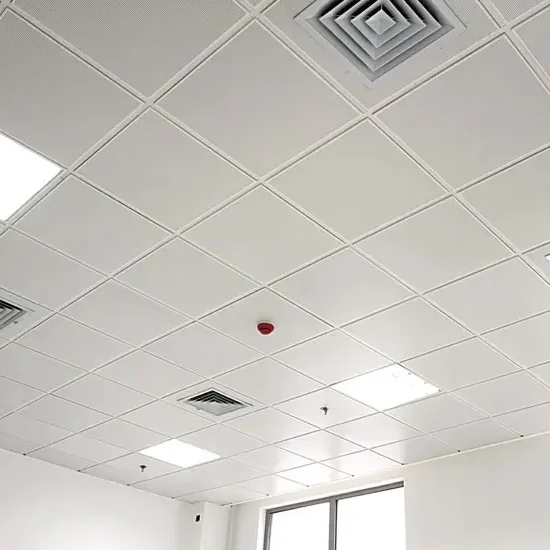 White modular metal ceiling with lighting and ventilation