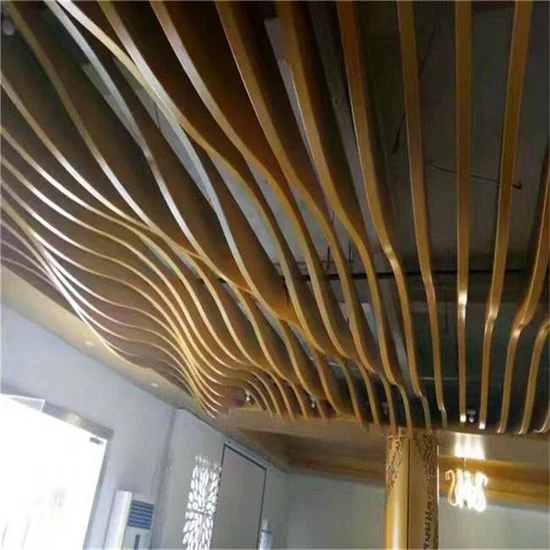 Gold-toned curved baffle ceiling application